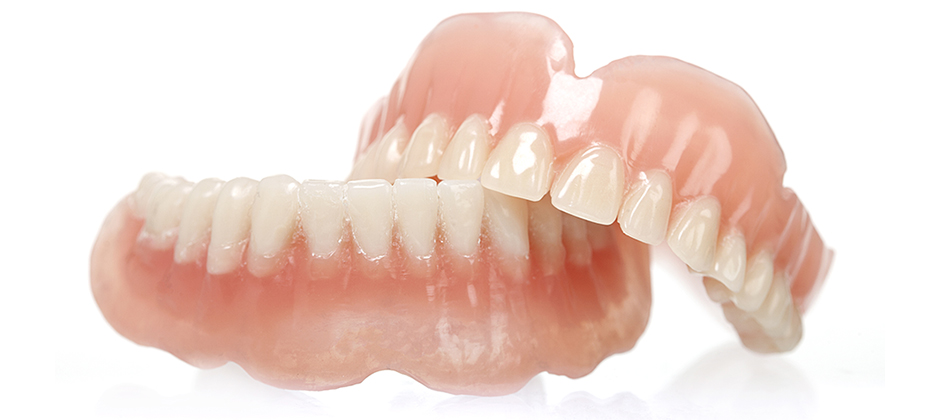 meglio la dentiera o gli impianti